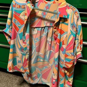 Button down asymmetrical shapes top